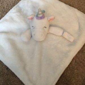 Carters unicorn Blanket holds baby pacifier